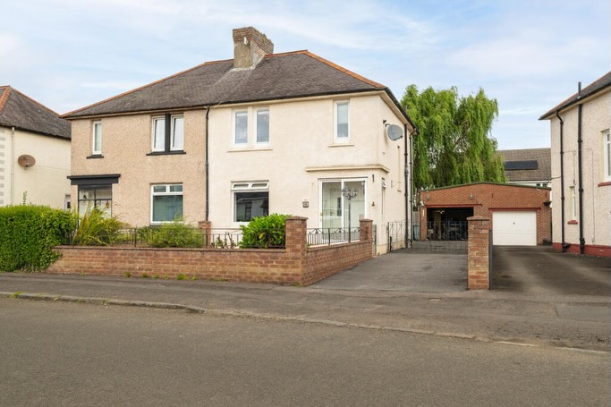 IT STARTS AS A THREE-BEDROOM SEMI. THEN THINGS GET INTERESTING. A conservatory. Gardens front and back. Enough driveway 